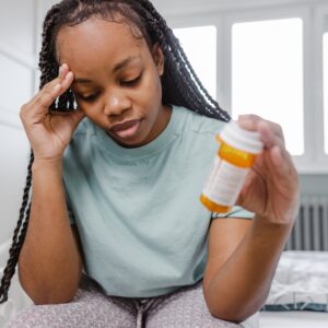 Woman experiencing side effects of medication